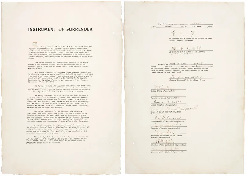 Both pages of the Instrument of Surrender: the printed title and terms on the left page, and the block of signature lines, each carrying a printed country label, on the right page